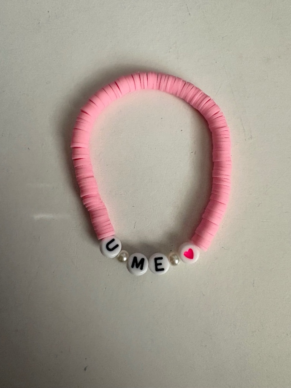 Olivia Rodrigo “u + me = <3” bracelet